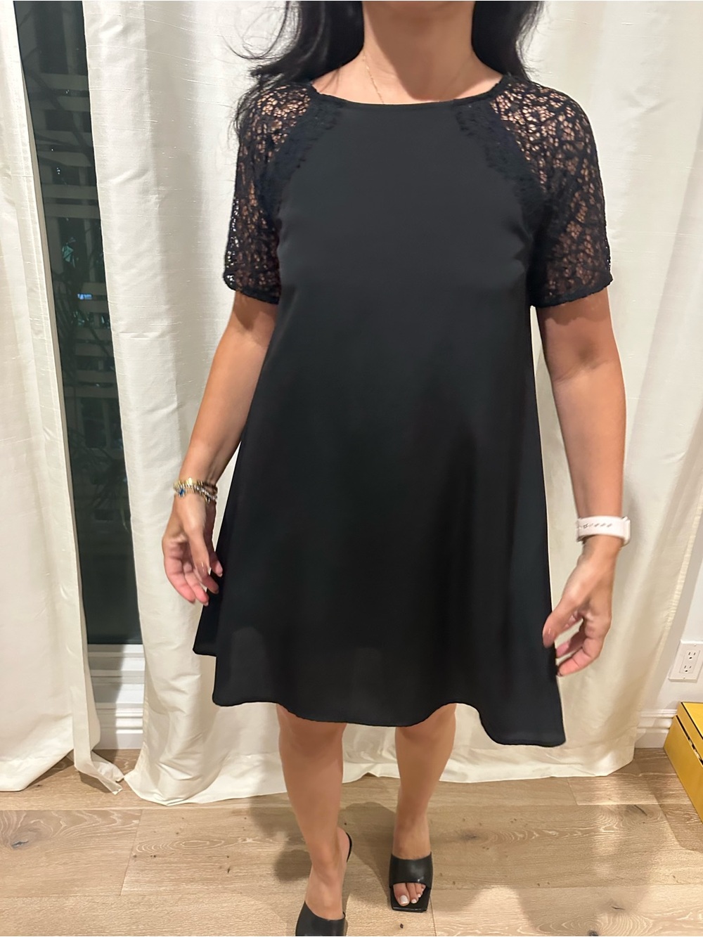 Black swing dress with lace